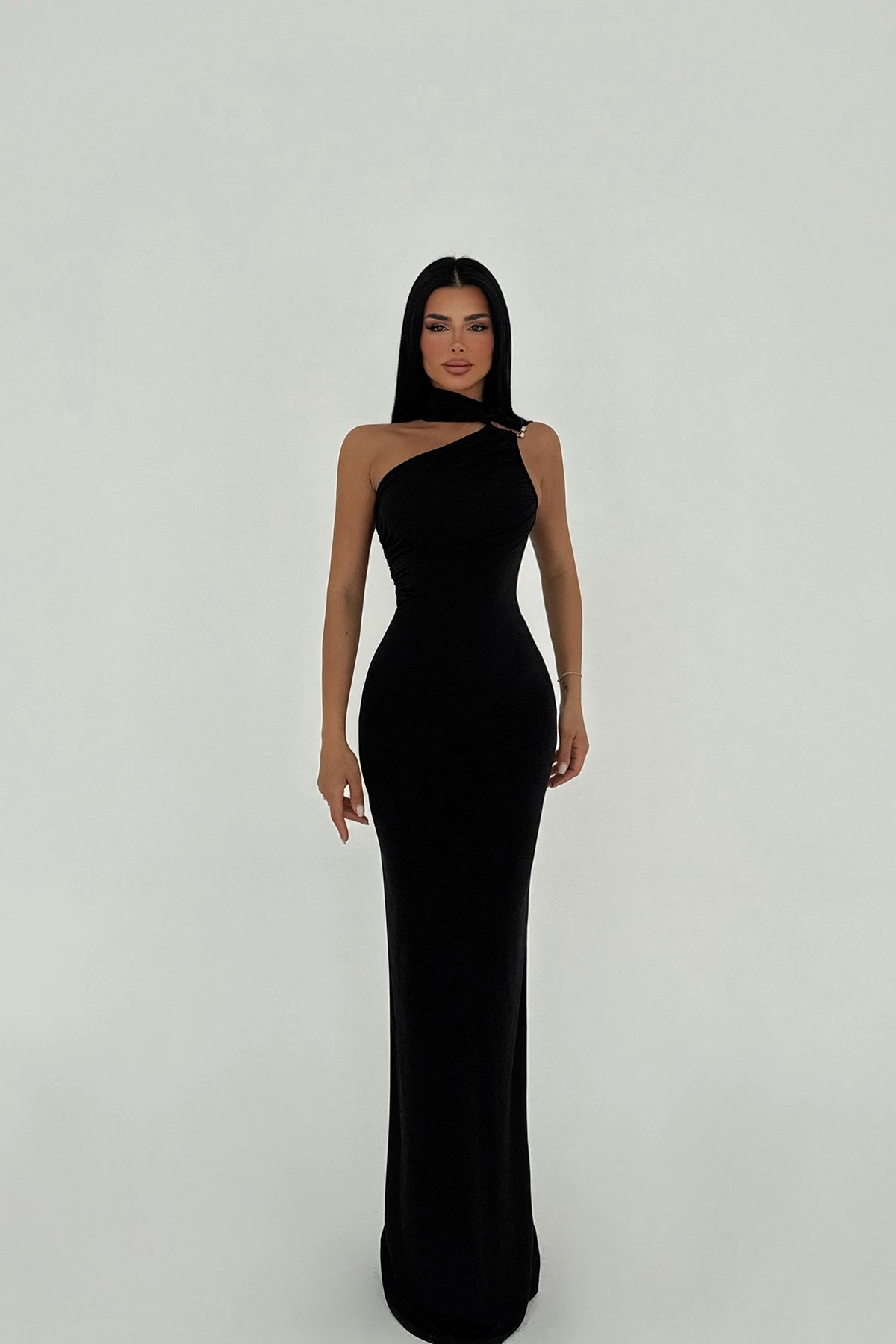 Model wearing Midnight Grace black evening gown with one-shoulder silver detail – LARYVOE women’s clothing