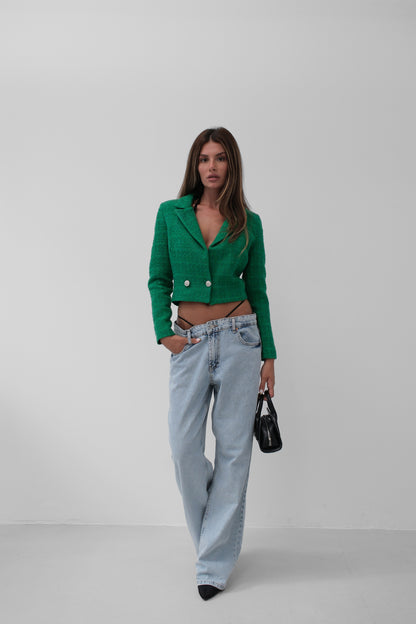 Model wearing emerald cropped bouclé blazer with silver buttons – LARYVOE women’s jacket